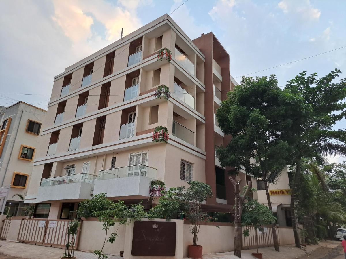Bouquet Residency Hotel Nashik Bagian luar foto