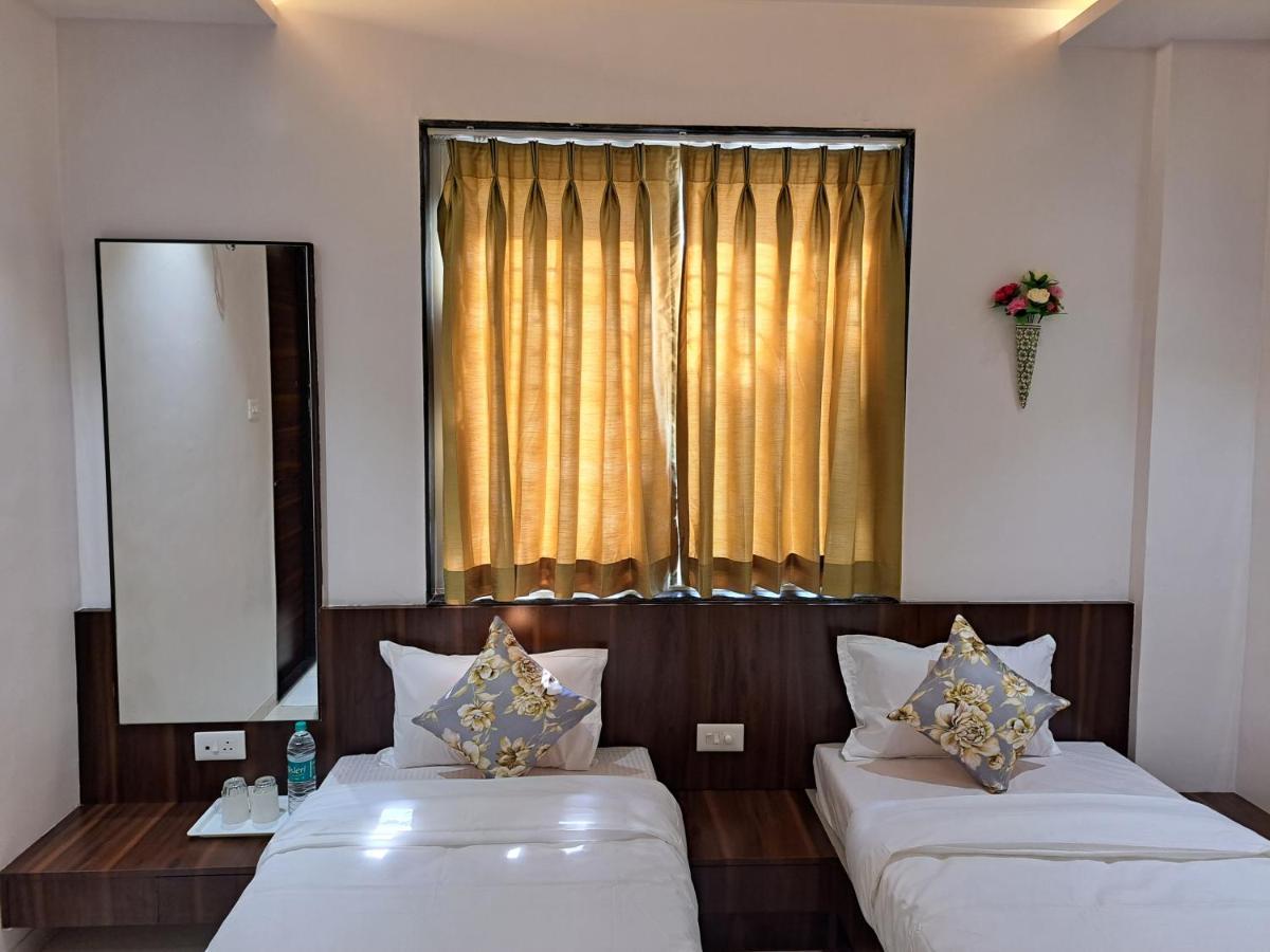 Bouquet Residency Hotel Nashik Bagian luar foto